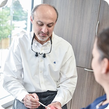 Dr. Ali Givehchian Providing Patient Education | Nova Dental Care | General & Family Dentist | Bow Trail | SW Calgary